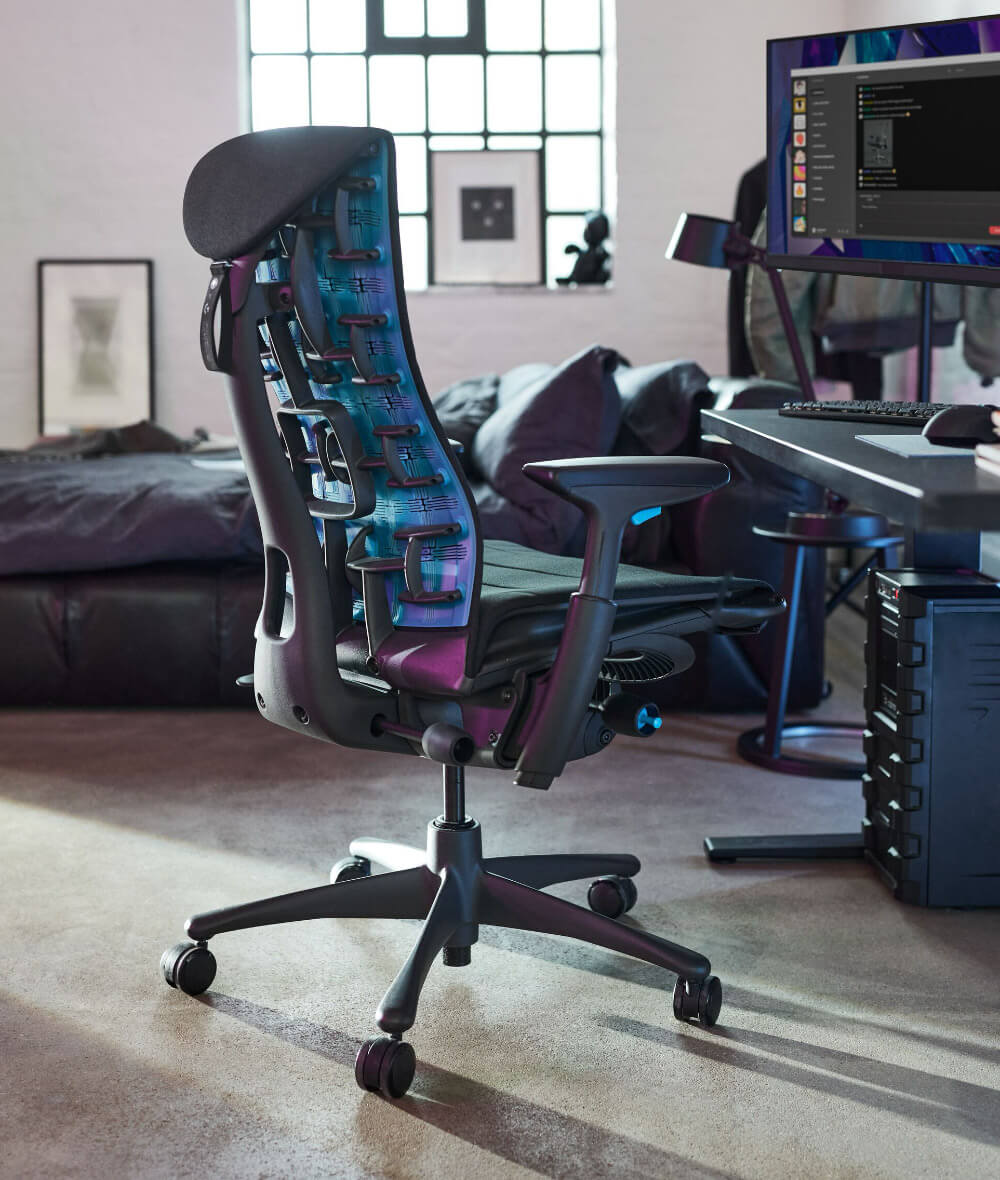 Embody Gaming in a dark bedroom setup, rear view